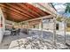 Covered patio with seating area and detached garage at 172 S Lowell Blvd, Denver, CO 80219