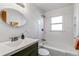 Clean bathroom with a white subway tile shower/tub combo at 172 S Lowell Blvd, Denver, CO 80219