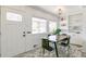 Charming dining area with a table and chairs near the entrance at 172 S Lowell Blvd, Denver, CO 80219