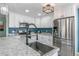 Modern kitchen featuring stainless steel appliances and farmhouse sink at 172 S Lowell Blvd, Denver, CO 80219