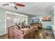 Open living area featuring a sectional sofa and hardwood floors at 172 S Lowell Blvd, Denver, CO 80219