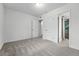 The empty space in this bedroom is easily accessible to other rooms in the house at 981 Ursula St, Aurora, CO 80011