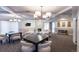 Spacious common room with seating and game tables at 800 N Pearl St # 602, Denver, CO 80203