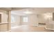 Spacious basement with tile flooring, natural light, and a cozy window seat at 7498 W Saratoga Pl, Littleton, CO 80123