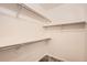 White closet with chrome shelving and white walls at 7498 W Saratoga Pl, Littleton, CO 80123