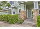 Charming front entrance showcasing stone pillars and a well-maintained walkway at 7498 W Saratoga Pl, Littleton, CO 80123