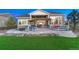 Spacious backyard oasis with patio and pergola at 3308 Carabiner St, Castle Rock, CO 80108