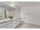 Basement bathroom with double vanity and tiled floor at 3308 Carabiner St, Castle Rock, CO 80108