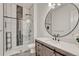 Modern bathroom with a large walk-in shower and floating vanity at 3308 Carabiner St, Castle Rock, CO 80108