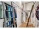 Spacious walk-in closet with custom shelving and ladder access at 3308 Carabiner St, Castle Rock, CO 80108