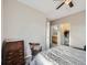 Spacious main bedroom with views to the en suite bathroom and walk-in closet at 8481 W Union Ave # 4-203, Littleton, CO 80123