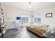 Bedroom with hardwood floors, modern furniture, and windows overlooking the yard, creating a calming atmosphere at 3644 Pinedale St, Boulder, CO 80301