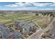 Aerial view showcasing the residential community near a large green athletic field at 3644 Pinedale St, Boulder, CO 80301