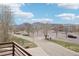Balcony overlooking a parking lot, trees and mountains in the distance at 3644 Pinedale St, Boulder, CO 80301