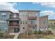 Modern townhome with multiple balconies, complemented by low-maintenance landscaping at 3644 Pinedale St, Boulder, CO 80301