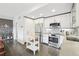Modern kitchen featuring stainless steel appliances and gray backsplash at 3644 Pinedale St, Boulder, CO 80301