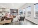 Open living room with hardwood floors, large windows and modern decor at 3644 Pinedale St, Boulder, CO 80301