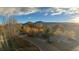 Scenic view of the mountains and trees, with sun reflecting through the neighborhood at 3644 Pinedale St, Boulder, CO 80301