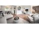 Inviting living space features an open floor plan, modern decor, and an adjacent dining area at 6251 W 74Th Ave, Arvada, CO 80003