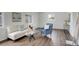 Inviting living room with modern furniture and stylish wood laminate flooring at 2056 Fulton St, Aurora, CO 80010