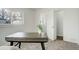 Bright office featuring a modern desk and chair, complemented by fresh greenery and natural light at 2056 Fulton St, Aurora, CO 80010