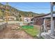 Outdoor seating and fire pit in a cozy backyard, perfect for enjoying mountain views at 230 Miner St, Idaho Springs, CO 80452