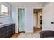 Bedroom with closet space and view to another living space at 230 Miner St, Idaho Springs, CO 80452