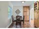 Eat-in kitchen area with view into another room at 1235 Dahlia St, Denver, CO 80220