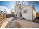 Backyard featuring a patio, wooden deck, and house exterior at 12977 W Dorado Pl, Littleton, CO 80127