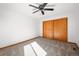 Bedroom with neutral carpet flooring, and double closets at 12977 W Dorado Pl, Littleton, CO 80127