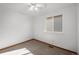 Cozy bedroom with neutral carpet, window, and ceiling fan at 12977 W Dorado Pl, Littleton, CO 80127