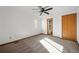 Bright bedroom with natural light from a window and a ceiling fan at 12977 W Dorado Pl, Littleton, CO 80127