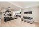 Finished basement featuring a home gym and a cozy lounge area, perfect for recreation and relaxation at 1994 Spencer Ave, Castle Rock, CO 80104