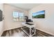 Bright home office with a large window and desk, offering a productive workspace at 1994 Spencer Ave, Castle Rock, CO 80104