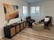 Cozy living room with comfortable seating, stylish accents, and plenty of natural light at 5612 S Lansing Ct, Englewood, CO 80111