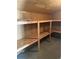 This unfinished storage room features built in shelving at 5612 S Lansing Ct, Englewood, CO 80111