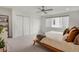 Bright bedroom with natural light, a ceiling fan, carpet, and double closets for plenty of storage at 1921 Hooker St, Denver, CO 80204
