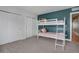 Cozy bedroom featuring a bunk bed and a large closet with sliding doors at 1921 Hooker St, Denver, CO 80204