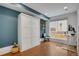 Versatile room with a Murphy bed, a modern desk, and a bright window at 1921 Hooker St, Denver, CO 80204