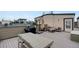 Spacious rooftop deck with outdoor seating, BBQ grill, and dining area, perfect for entertaining and relaxing at 1921 Hooker St, Denver, CO 80204