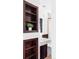 Bathroom featuring custom wooden cabinets and built in shelving at 2030 Cody St, Lakewood, CO 80215