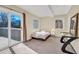 Bedroom with sliding glass door access to an exterior balcony and mountain views at 2885 Springdale Ln, Boulder, CO 80303
