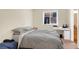 Cozy bedroom with large bed, modern desk, and window providing natural light at 2885 Springdale Ln, Boulder, CO 80303