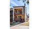 Multi-level townhouse with inviting balconies, offering outdoor living space and a glimpse of the surrounding landscape at 2885 Springdale Ln, Boulder, CO 80303