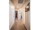 Hallway with carpet and doors leading to multiple rooms at 17548 E 103Rd Dr, Commerce City, CO 80022