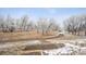 Pathway in a park with frozen trees, a walking path, and a garden at 7603 Yule Ct, Arvada, CO 80007