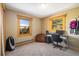 Bedroom with mountain views, neutral walls, wood trim, and carpeted floors at 636 Chute Rd, Golden, CO 80403