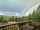 Enjoy a double rainbow from this beautiful view from the deck at 636 Chute Rd, Golden, CO 80403
