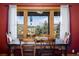 Cozy dining room features nature views at 636 Chute Rd, Golden, CO 80403