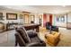 Cozy game room featuring a pool table, comfortable seating, and natural lighting at 636 Chute Rd, Golden, CO 80403